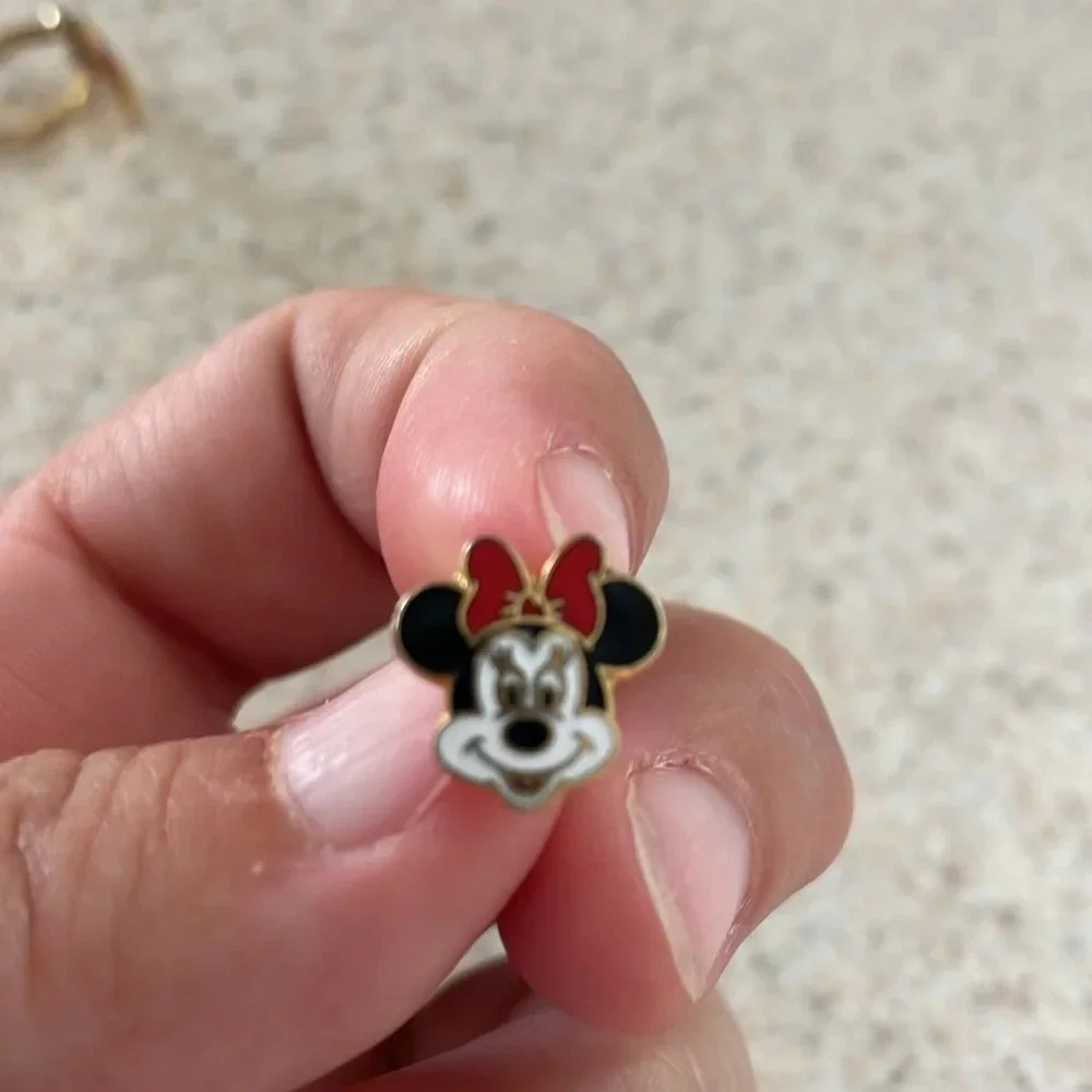 Disney Mickey Mouse child’s ring/Minnie Mouse pin lot.
